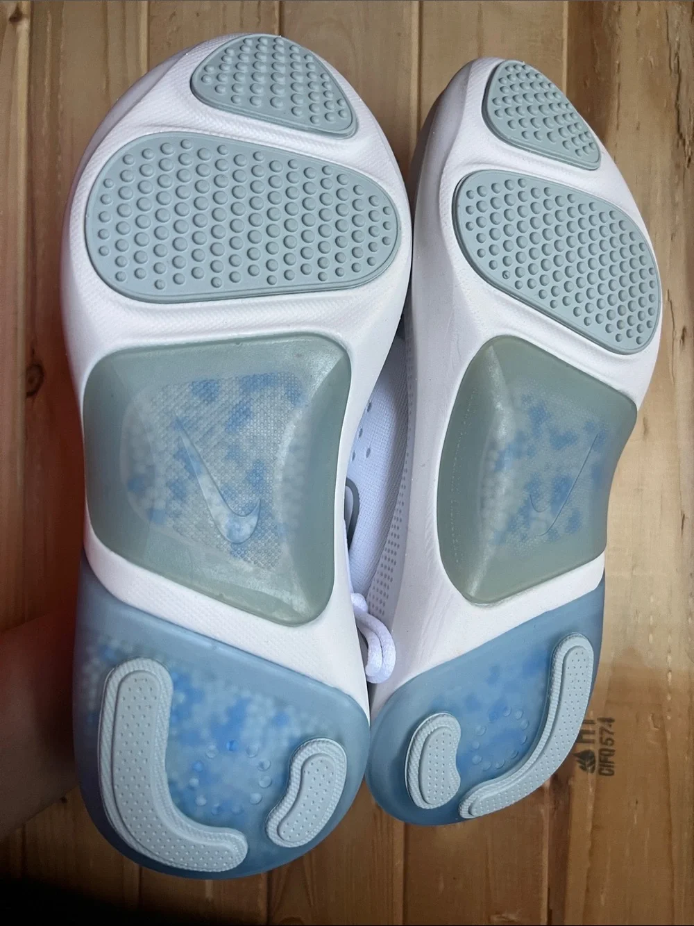 Nike Women’s White with Light Blue Accent Running Shoes